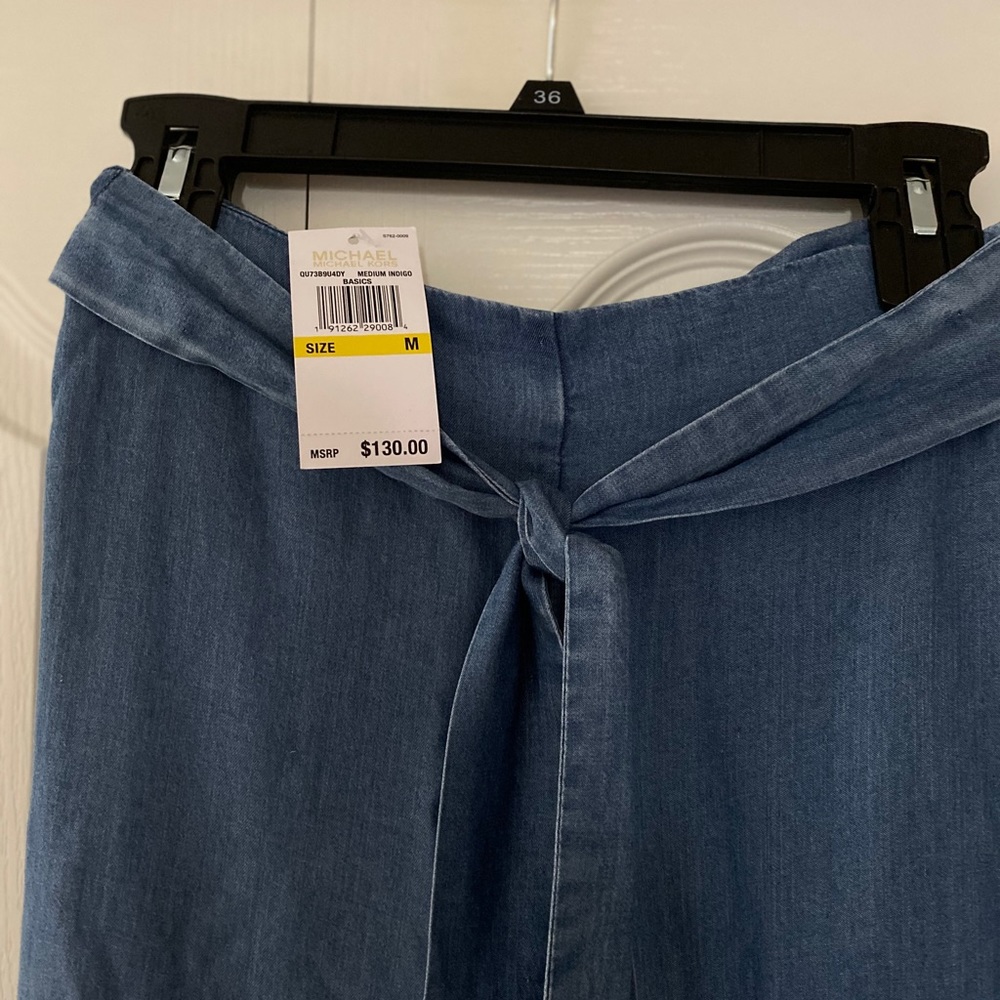 Michael Korda medium indigo jeans